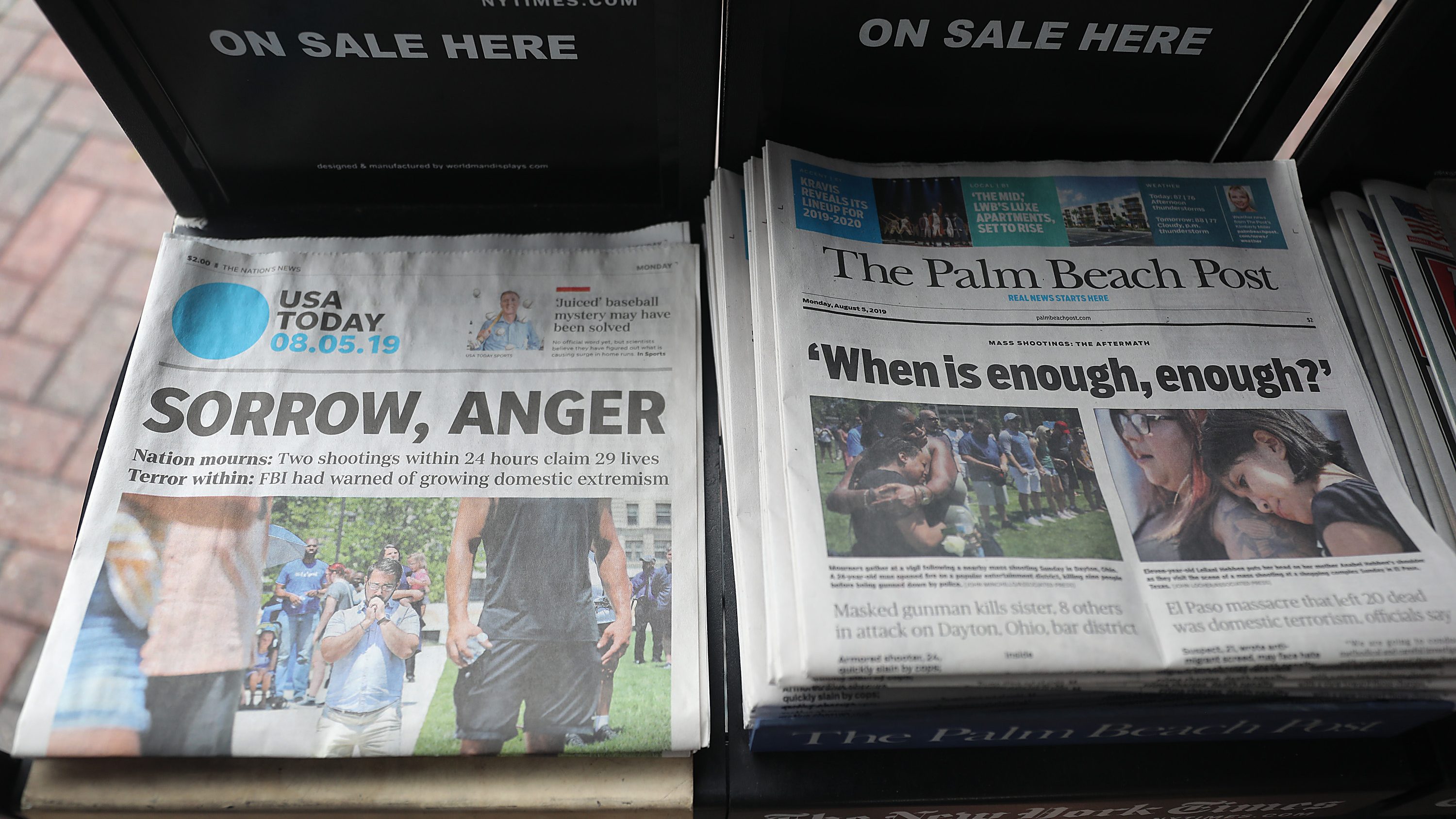 A GateHouse Media owned Palm Beach Post and the Gannett Co. owned USA Today are seen for sale at a newsstand on August 05, 2019 in Palm Beach, Florida. The Post now is also owned by Gannett
