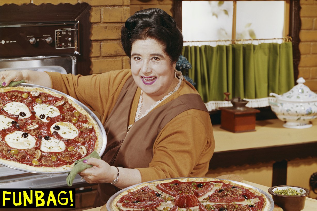 Woman preparing pizza in kitchen, portrait