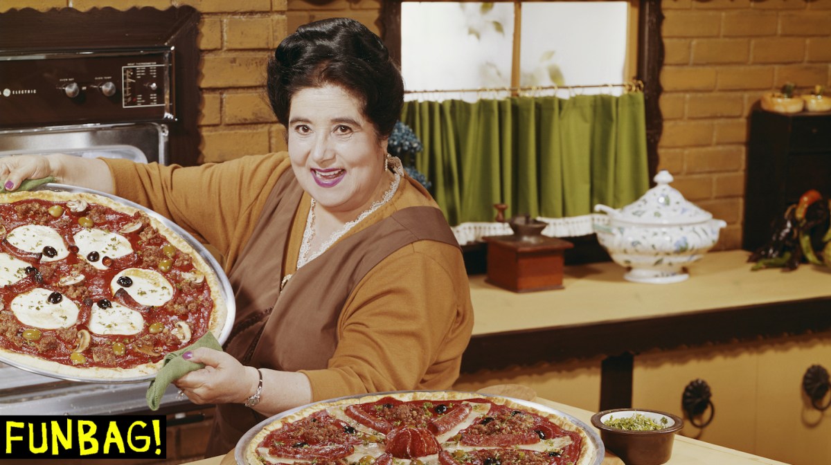 Woman preparing pizza in kitchen, portrait