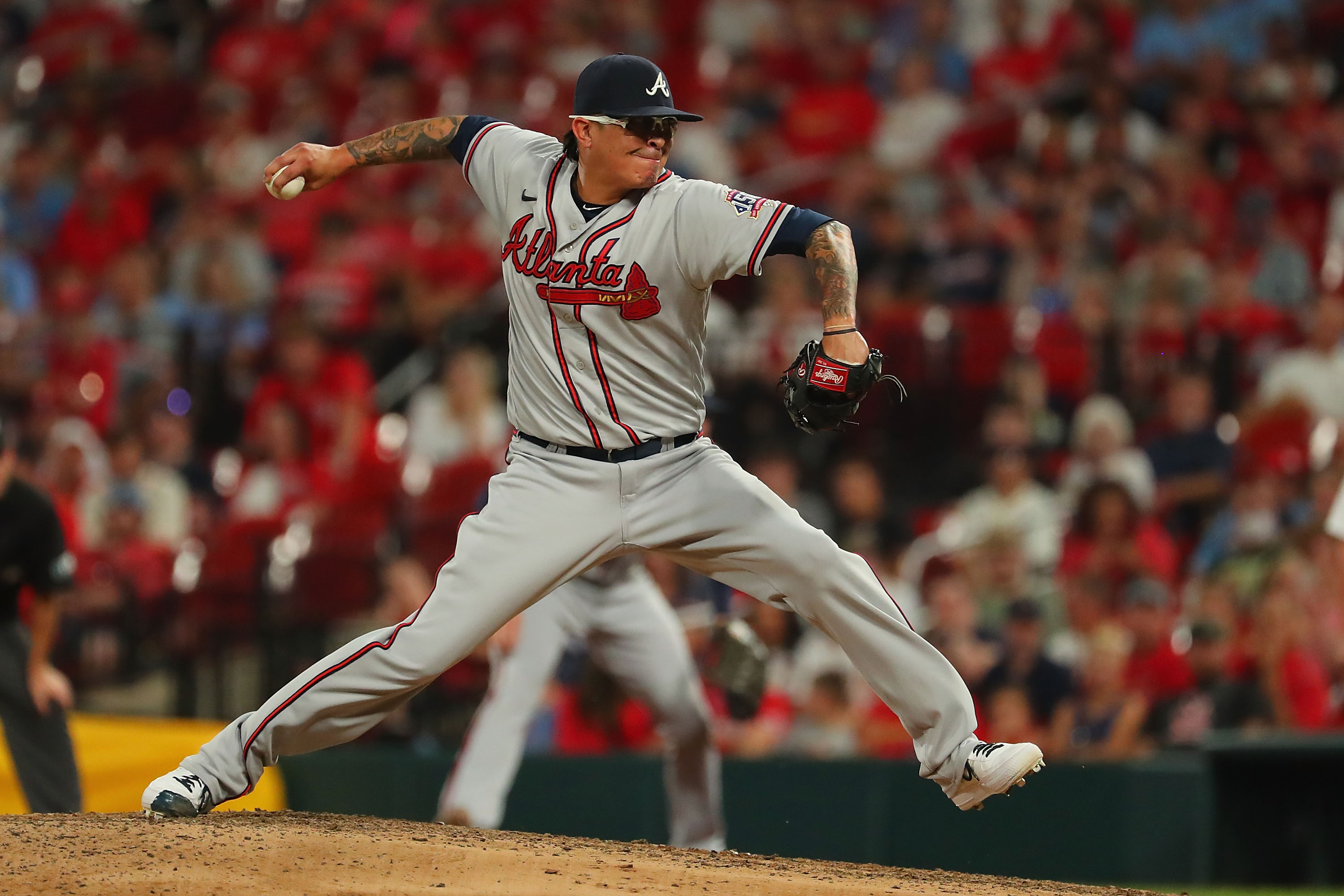 Veteran reliever Jesse Chavez pitches for the Braves against the Cardinals in a 2021 game.