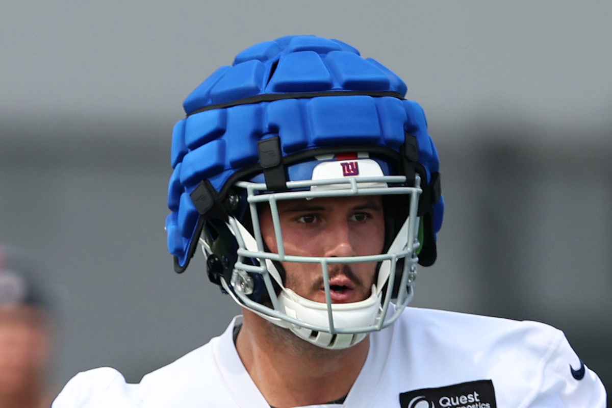 A New York Giant wearing a giant silly shell on his helmet