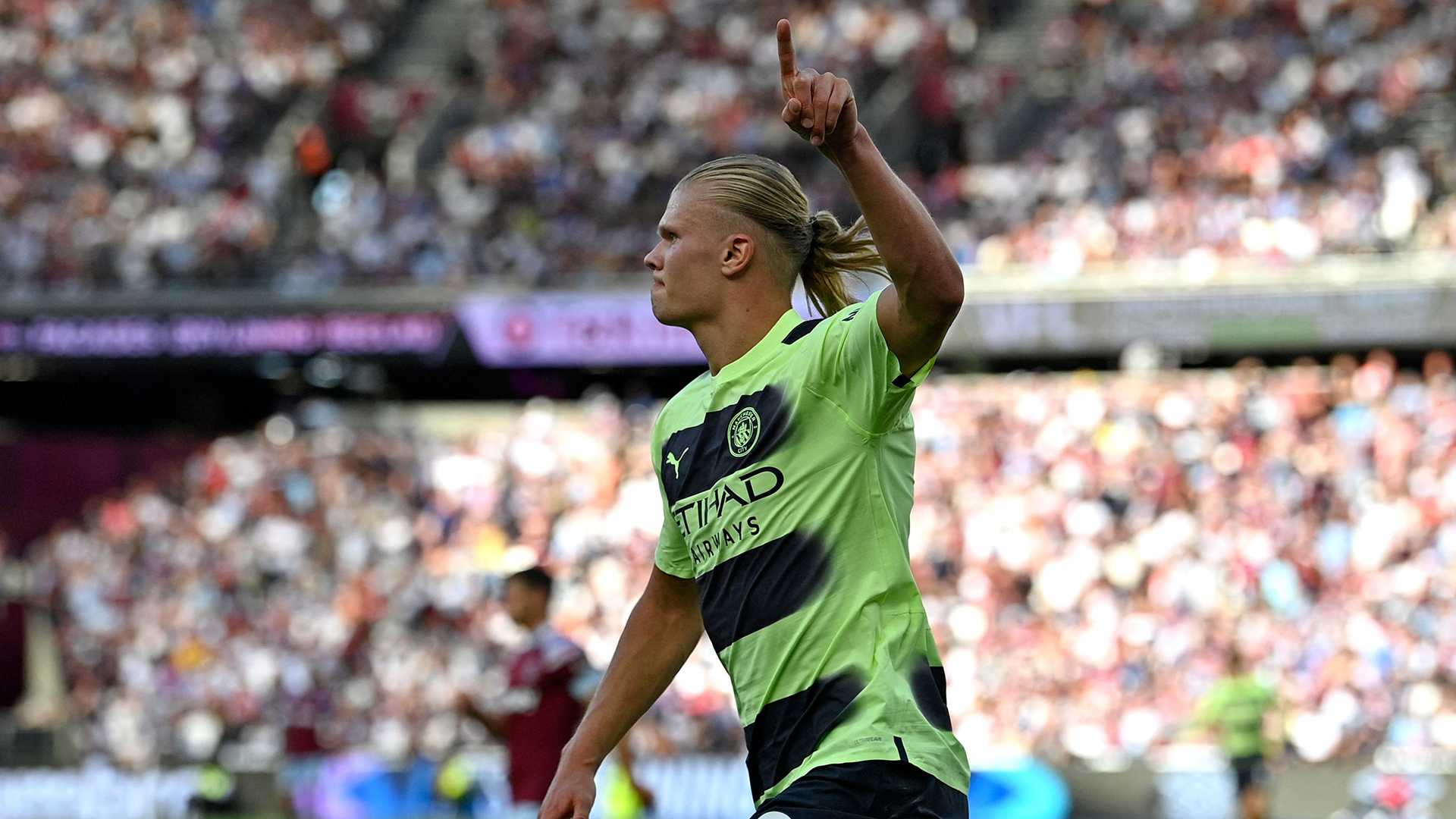 Manchester City's Norwegian striker Erling Haaland celebrates after scoring their second goal during the English Premier League football match between West Ham United and Manchester City at the London Stadium, in London on August 7, 2022.