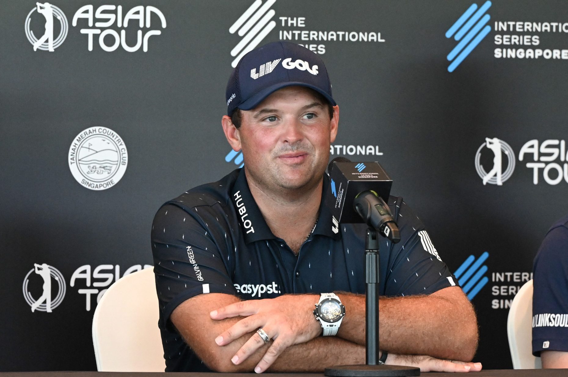 Patrick Reed at a press conference