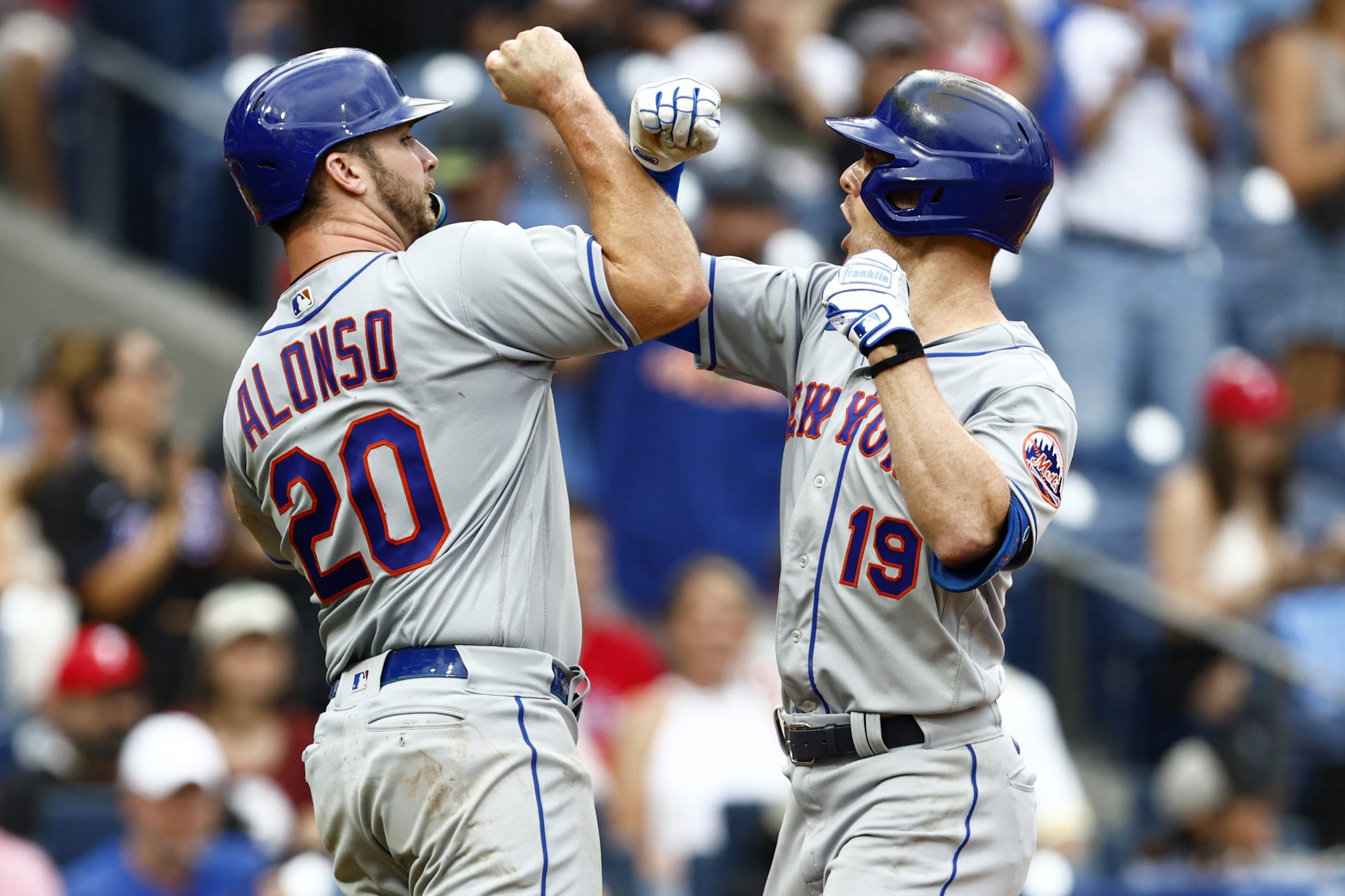 Mark Canha celebrates his home run with Pete Alonso