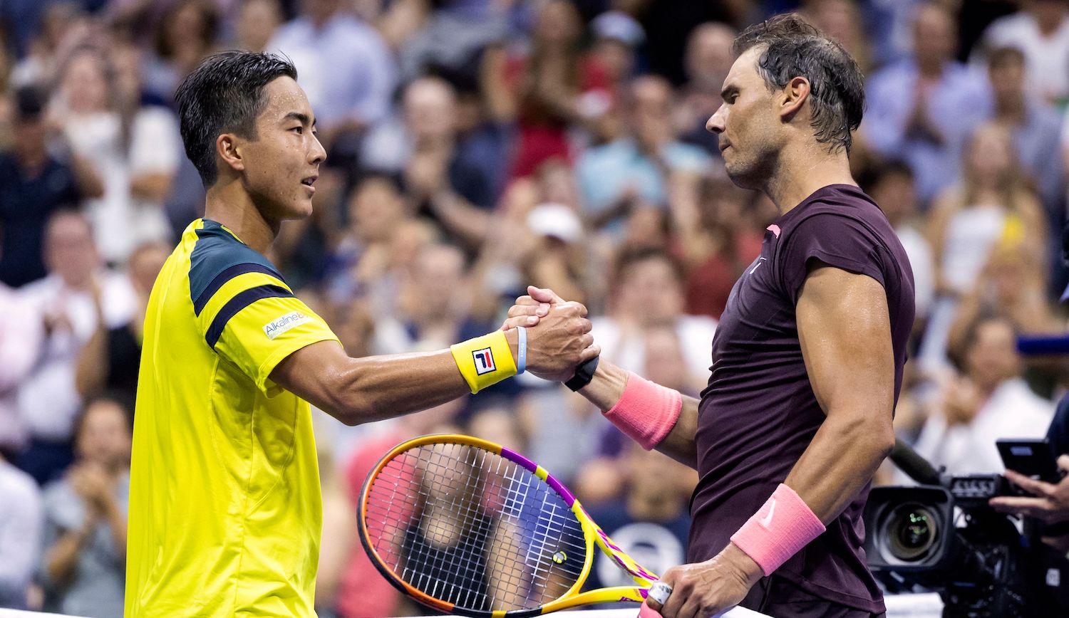 Spain's Rafael Nadal (R) greets Australia's Rinky Hijikata (L) during their 2022 US Open Tennis tournament men's singles first round match at the USTA Billie Jean King National Tennis Center in New York, on August 30, 2022. (Photo by COREY SIPKIN / AFP) (Photo by COREY SIPKIN/AFP via Getty Images)