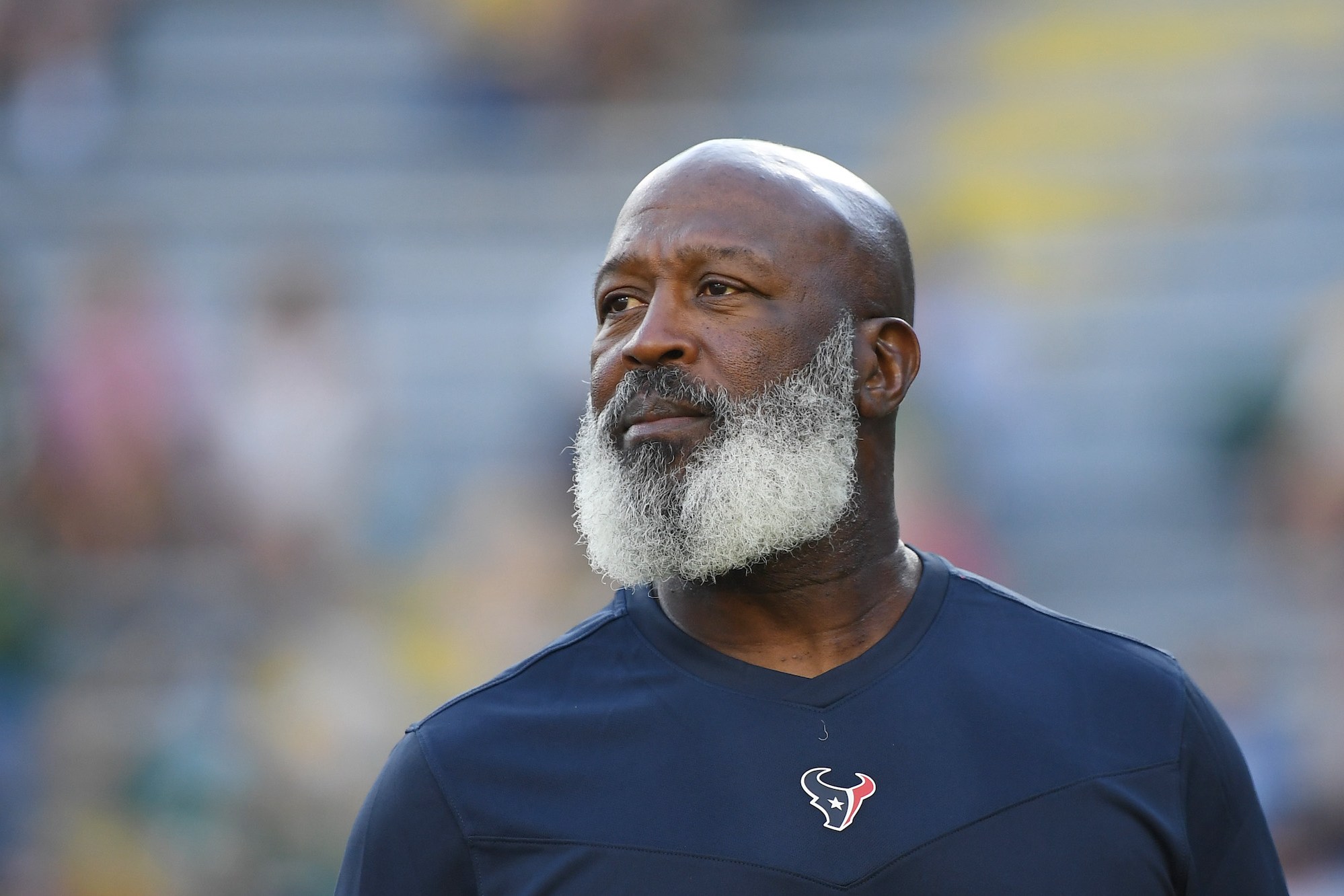GREEN BAY, WISCONSIN - AUGUST 14: Lovie Smith of the Houston Texans looks on before the preseason game against the Green Bay Packers at Lambeau Field on August 14, 2021 in Green Bay, Wisconsin. (Photo by Quinn Harris/Getty Images)
