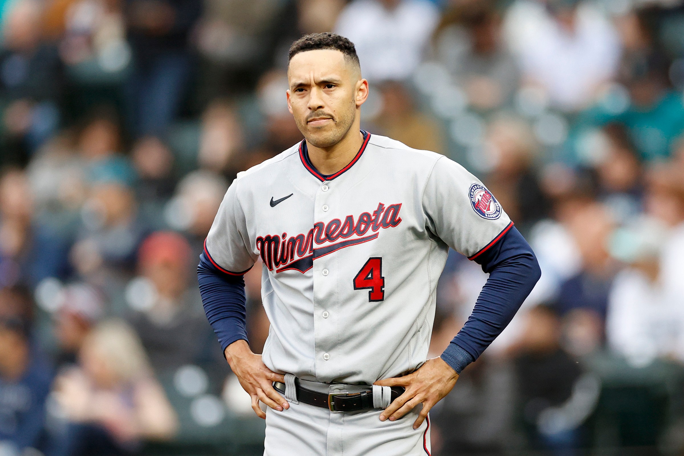 SEATTLE, WASHINGTON - JUNE 14: Carlos Correa #4 of the Minnesota Twins looks on during the game against the Seattle Mariners at T-Mobile Park on June 14, 2022 in Seattle, Washington.