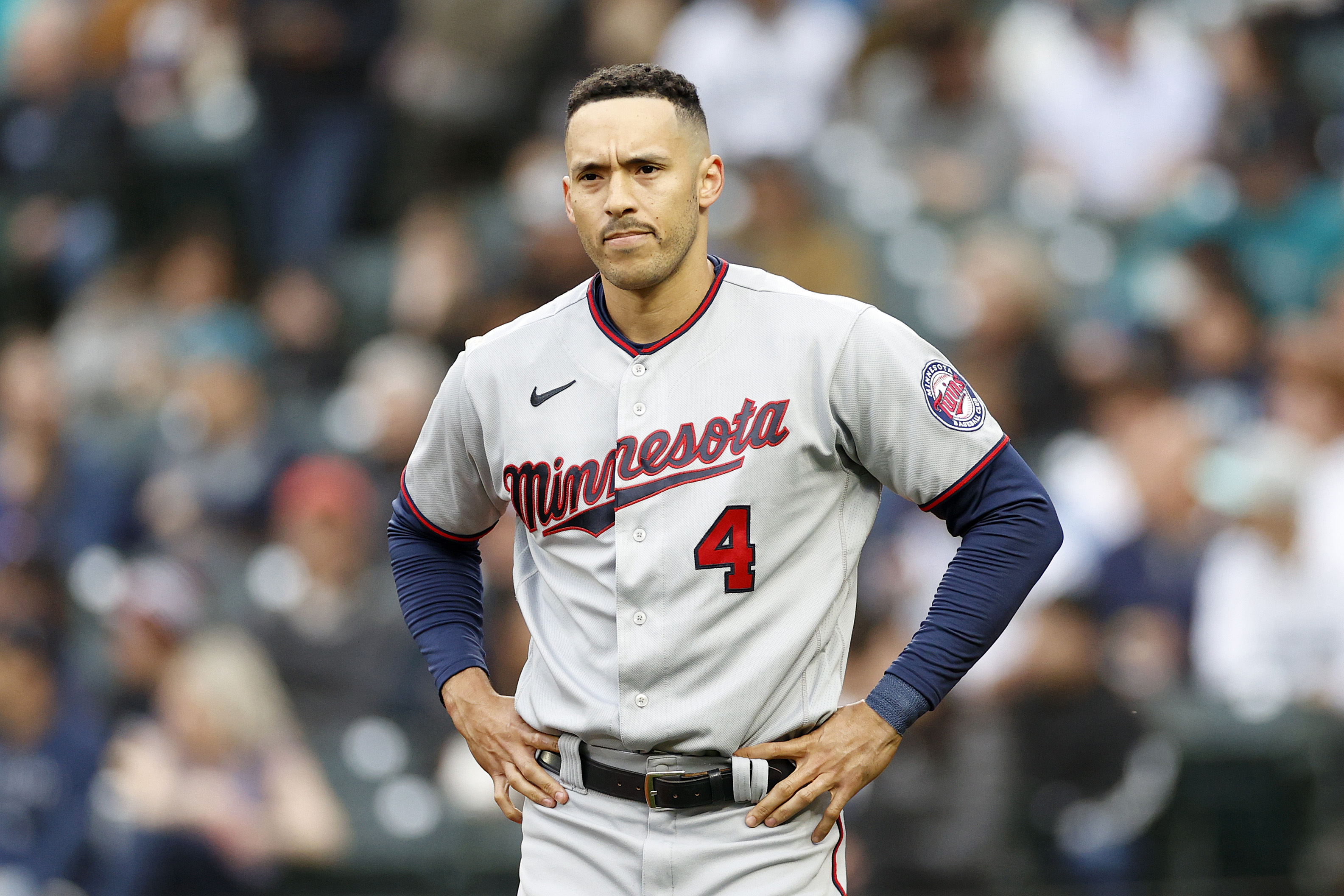 SEATTLE, WASHINGTON - JUNE 14: Carlos Correa #4 of the Minnesota Twins looks on during the game against the Seattle Mariners at T-Mobile Park on June 14, 2022 in Seattle, Washington.