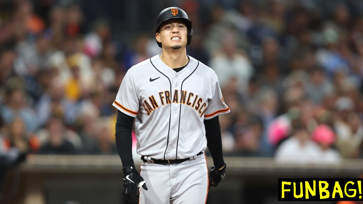SAN DIEGO, CALIFORNIA - JULY 08: Wilmer Flores #41 of the San Francisco Giants reacts to fouling a ball off his foot during the fouth inning of a game against the San Diego Padres at PETCO Park on July 08, 2022 in San Diego, California. (Photo by Sean M. Haffey/Getty Images)