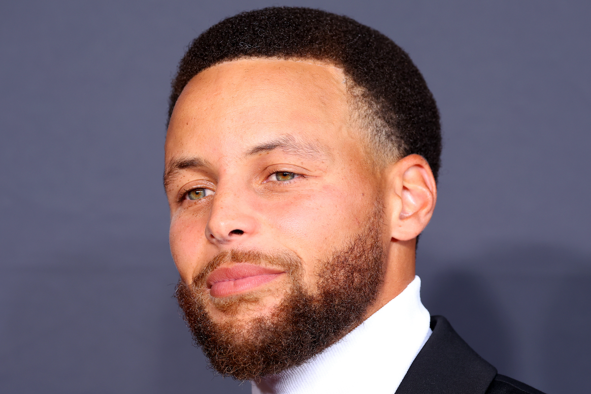 NBA superstar Steph Curry in a white turtleneck