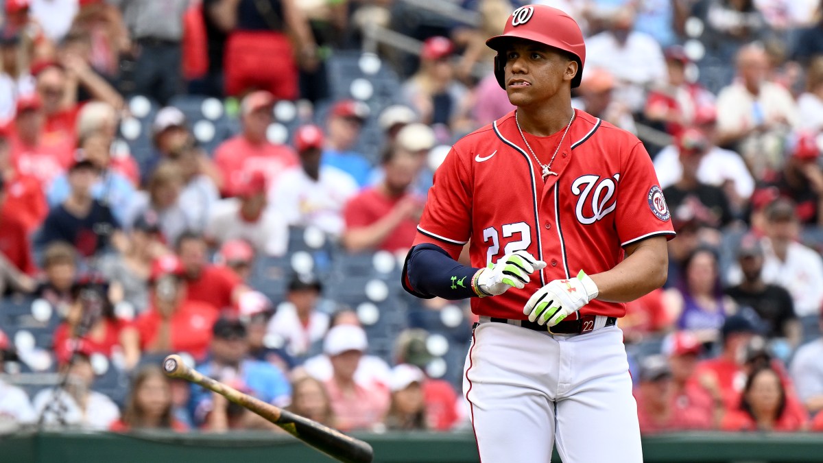 WASHINGTON, DC - JULY 31: Juan Soto #22 of the Washington Nationals tosses his bat after drawing a walk in the first inning against the St. Louis Cardinals at Nationals Park on July 31, 2022 in Washington, DC.