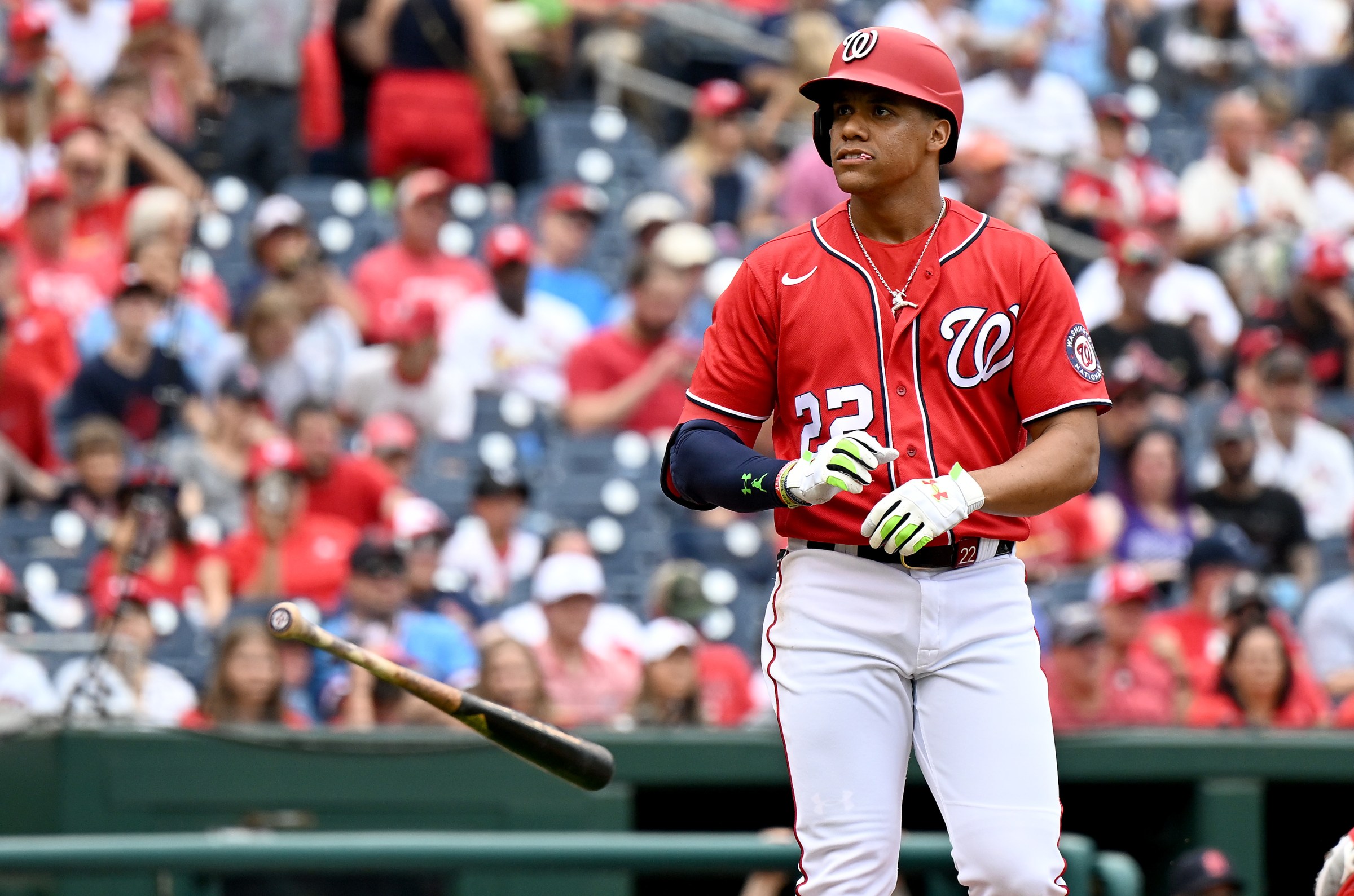 WASHINGTON, DC - JULY 31: Juan Soto #22 of the Washington Nationals tosses his bat after drawing a walk in the first inning against the St. Louis Cardinals at Nationals Park on July 31, 2022 in Washington, DC.