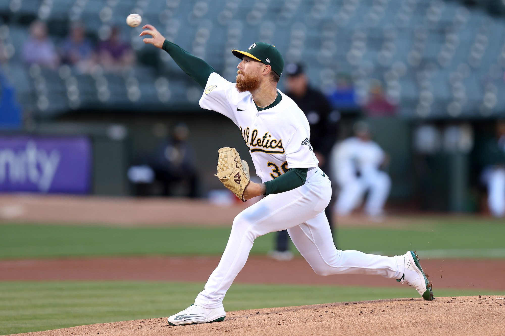 OAKLAND, CALIFORNIA - AUGUST 22: Adam Oller #36 of the Oakland Athletics pitches against the Miami Marlins in the first inning at RingCentral Coliseum on August 22, 2022 in Oakland, California. (Photo by Ezra Shaw/Getty Images)