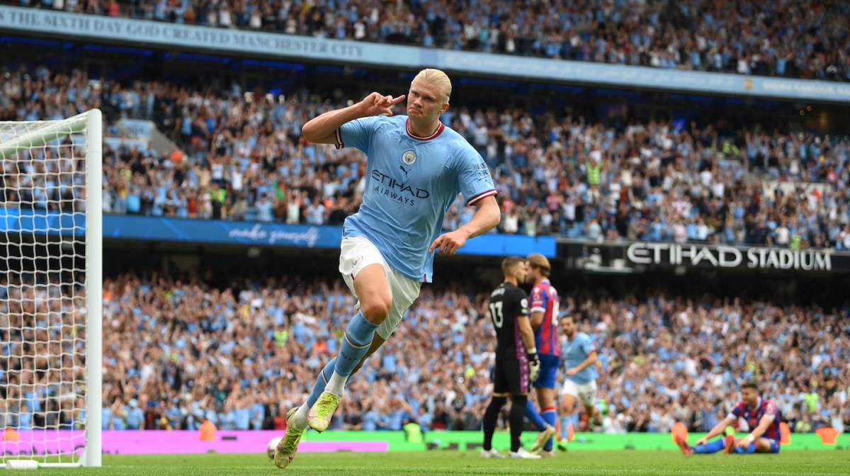 Erling Haaland of Manchester City celebrates his hat trick during the Premier League match between Manchester City and Crystal Palace at Etihad Stadium on August 27, 2022 in Manchester, England.