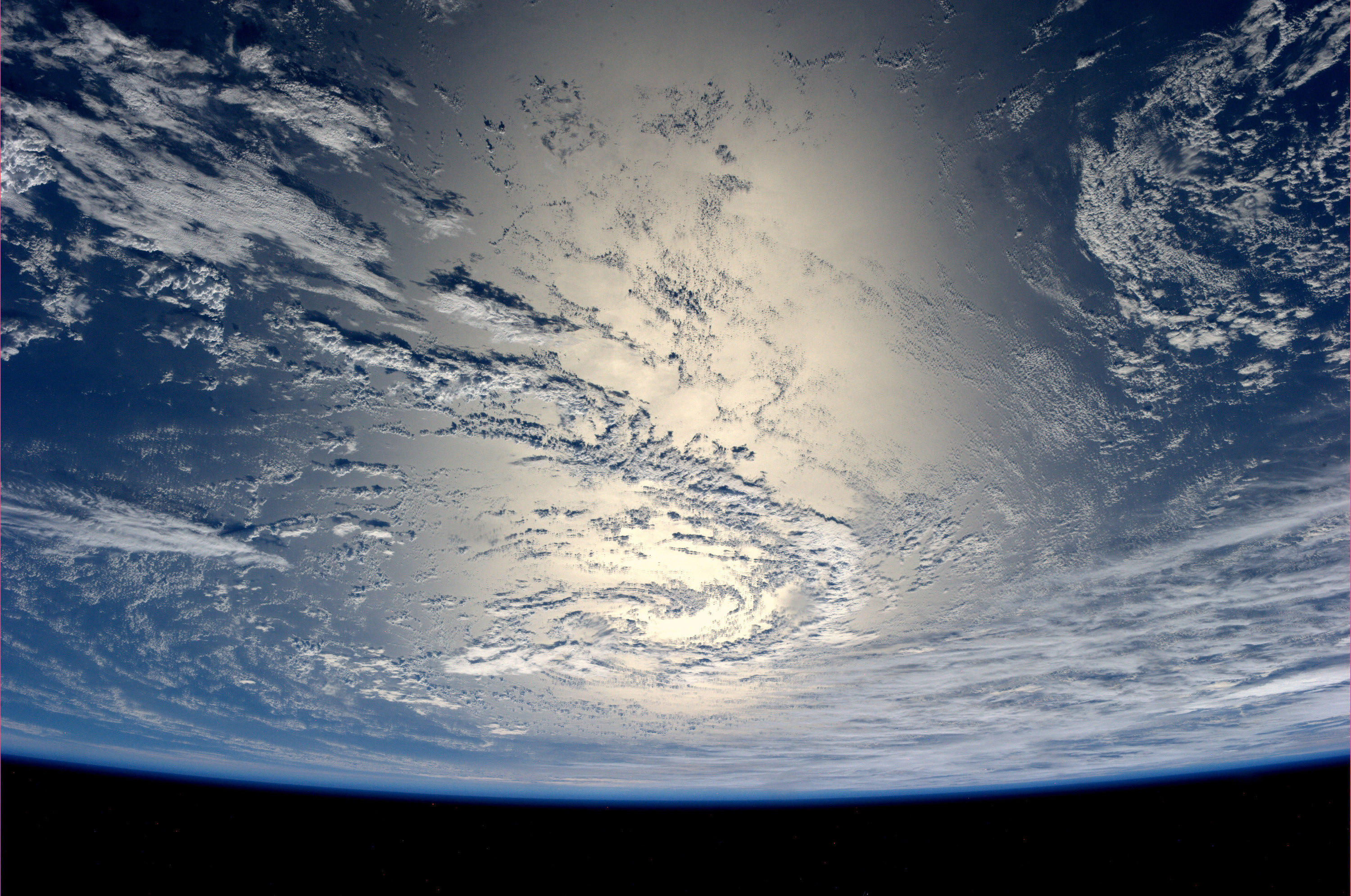 Title Earth glinting in the sun Released 17/07/2014 1:15 pm Copyright ESA/NASA Description Earth seen from space. ESA astronaut Alexander Gerst is sharing his incredible views from 400 km above on the International Space Station. Alexander will run over 100 experiments for all space agencies during his six-month Blue Dot mission.
