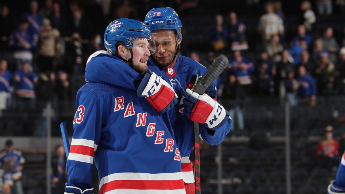 NEW YORK, NY - MARCH 02: K'Andre Miller #79 and Alexis Lafreniere #13 of the New York Rangers celebrate after a 5-3 win against the St Louis Blues at Madison Square Garden on March 2, 2022 in New York City. (Photo by Jared Silber/NHLI via Getty Images)
