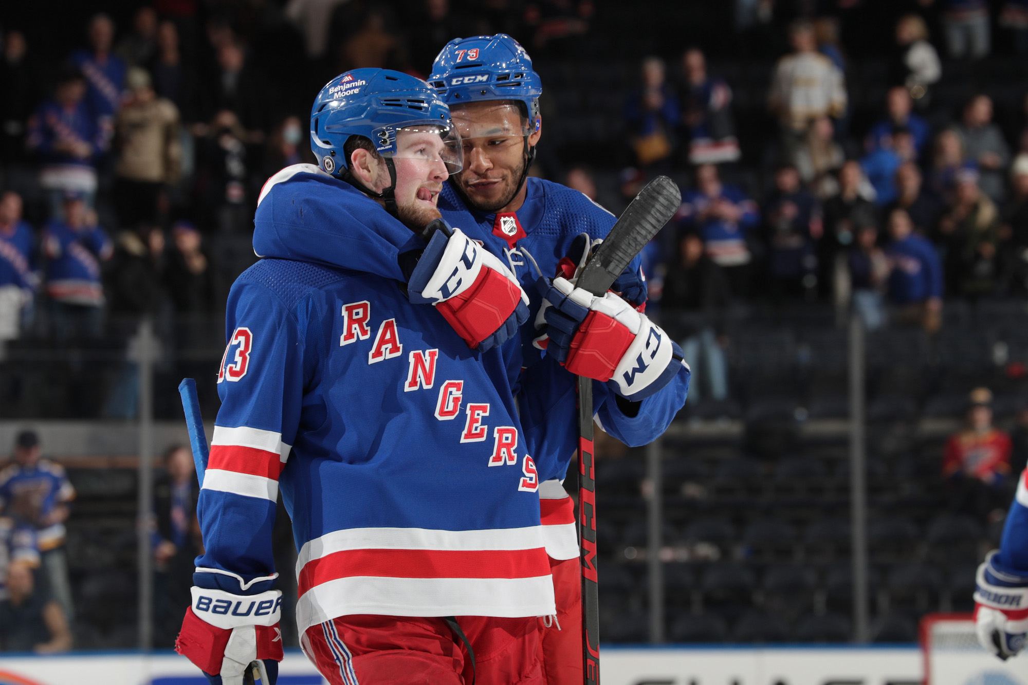 NEW YORK, NY - MARCH 02: K'Andre Miller #79 and Alexis Lafreniere #13 of the New York Rangers celebrate after a 5-3 win against the St Louis Blues at Madison Square Garden on March 2, 2022 in New York City. (Photo by Jared Silber/NHLI via Getty Images)