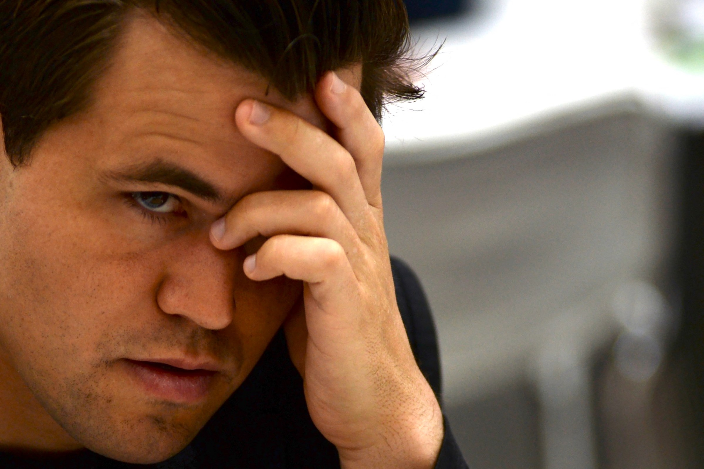 Magnus Carlsen looks intense.