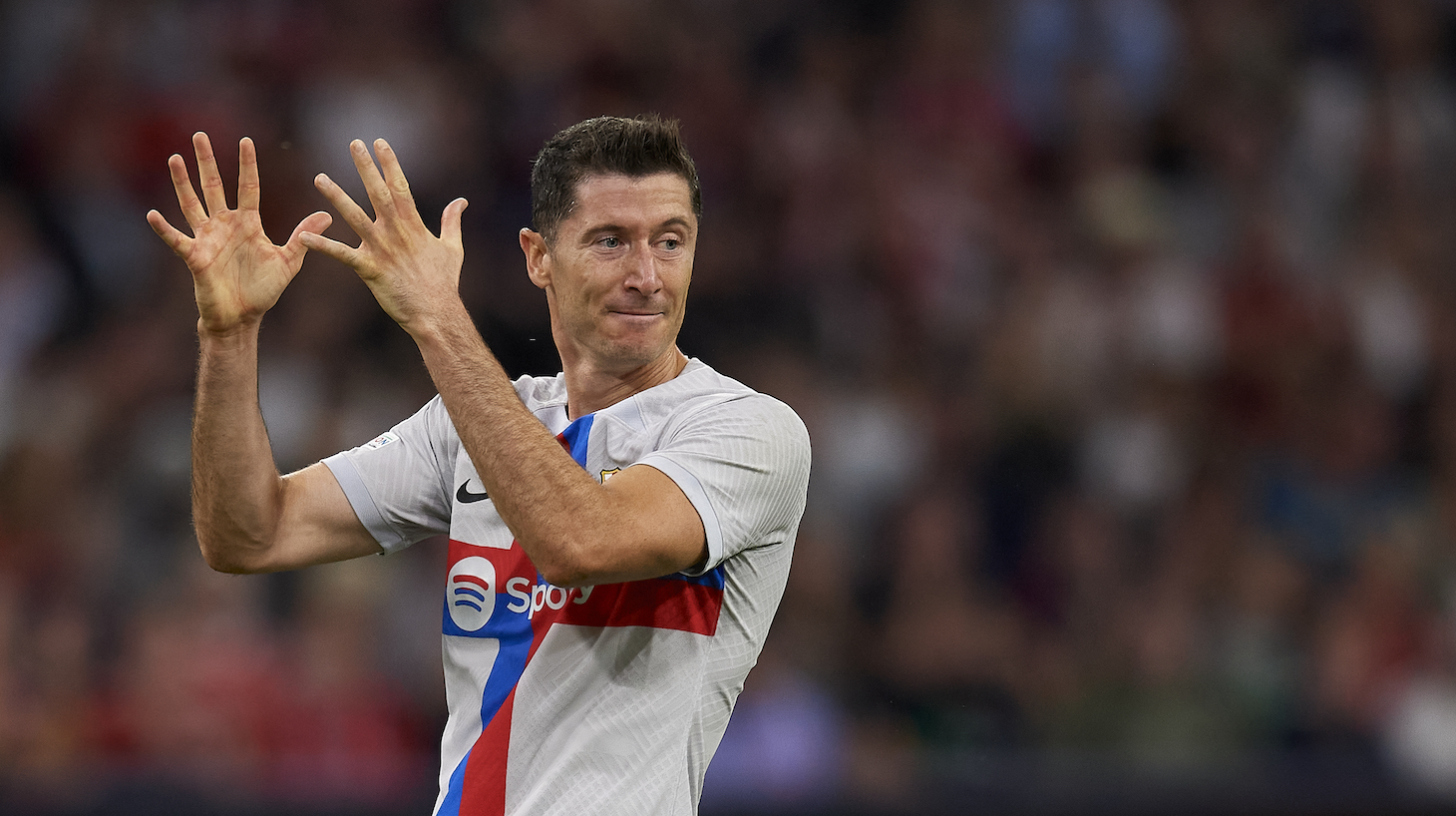 Robert Lewandowski centre-forward of Barcelona and Poland lament a failed occasion during the UEFA Champions League group C match between FC Bayern München and FC Barcelona at Allianz Arena on September 13, 2022 in Munich, Germany.