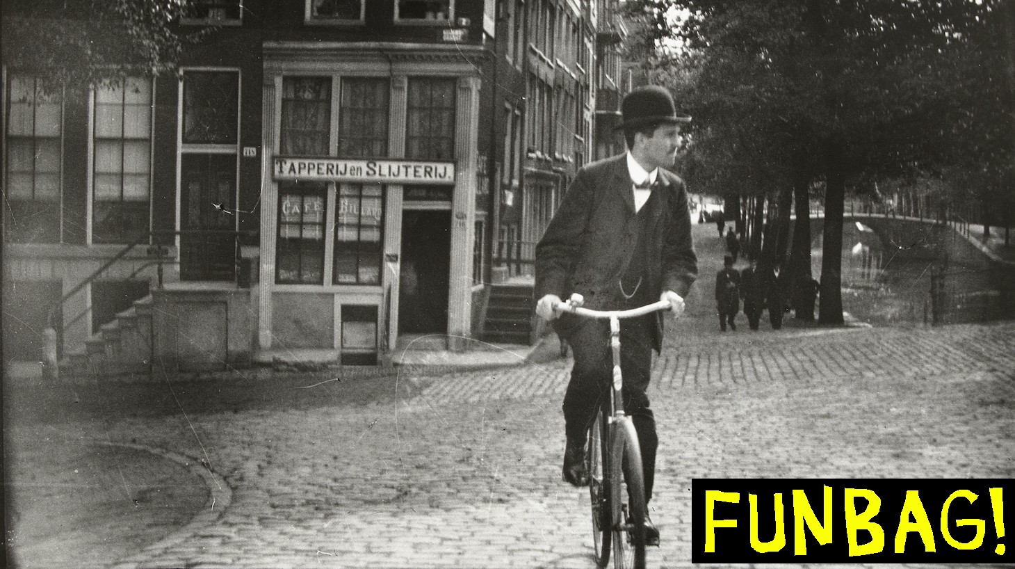 Cyclist on the Keizersgracht in Amsterdam, In the background the houses of Keizersgracht 718-716. On the right the Reguliersgracht., George Hendrik Breitner, printer: Harm Botman (mentioned on object), Amsterdam, printer: Netherlands, c. 1890 - c. 1910, paper, gelatin silver print, height 50.5 cm × width 40.0 cmheight 40.0 cm × width 27.4 cm. (Photo by: Sepia Times/Universal Images Group via Getty Images)
