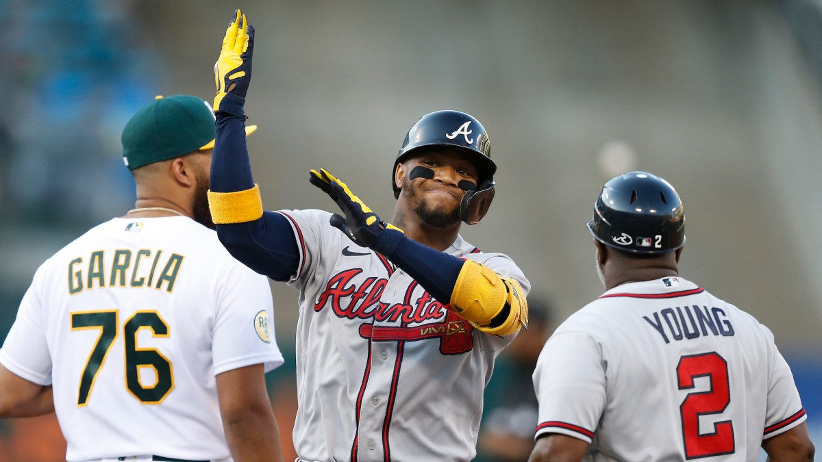 OAKLAND, CALIFORNIA - SEPTEMBER 06: Ronald Acuna Jr. #13 of the Atlanta Braves reacts after hitting a single in the top of the first inning against the Oakland Athletics at RingCentral Coliseum on September 06, 2022 in Oakland, California. (Photo by Lachlan Cunningham/Getty Images)