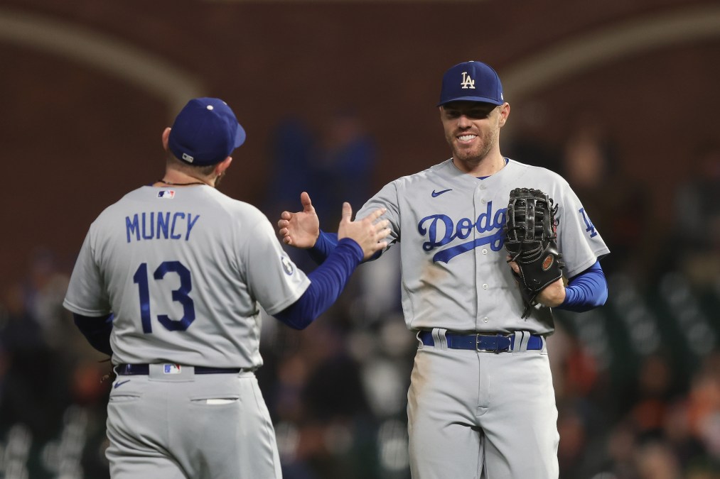 Freddie Freeman and Max Muncy congratulate each other after another Dodgers win against the Giants, this one on September 17, 2022.