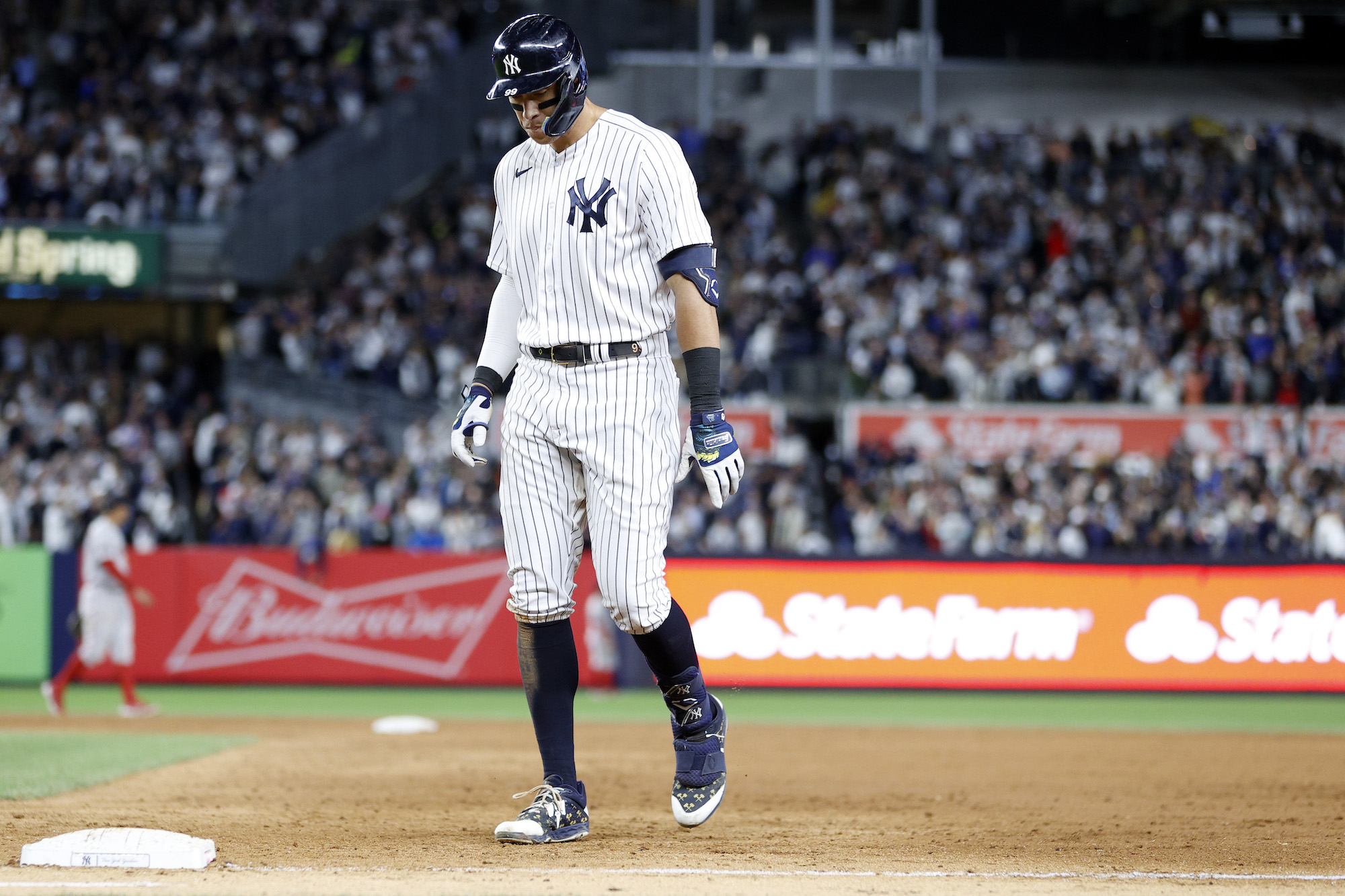 NEW YORK, NEW YORK - SEPTEMBER 22: Aaron Judge #99 of the New York Yankees reacts after flying out to center during the ninth inning against the Boston Red Sox at Yankee Stadium on September 22, 2022 in the Bronx borough of New York City. The Yankees won 5-4. (Photo by Sarah Stier/Getty Images)