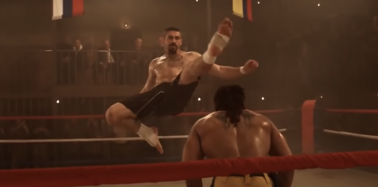 Scott Adkins does a flying kick