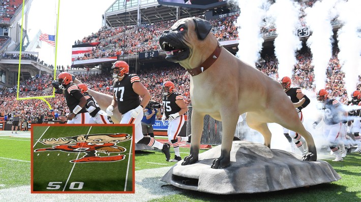 Browns horrifying helldogs as players walk onto the field. Inset: Brownie the elf
