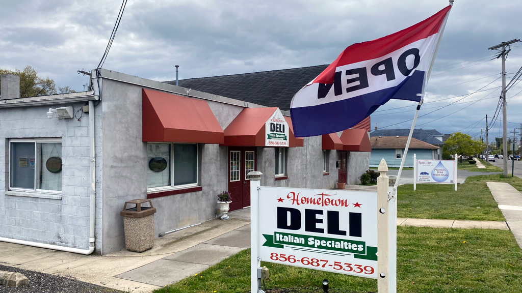 Hometown Deli with an OPEN flag