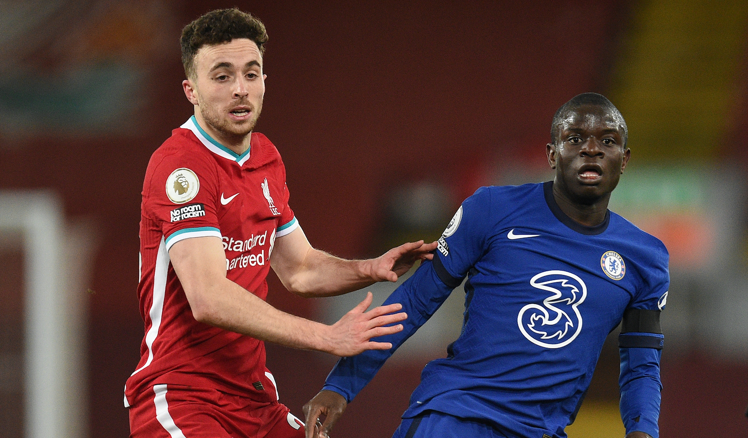 Liverpool's Diogo Jota (left) and Chelsea's N'Golo Kante battle for the ball during the Premier League match at Anfield, Liverpool. Picture date: Thursday March 4, 2021. (Photo by Oli Scarff/PA Images via Getty Images)