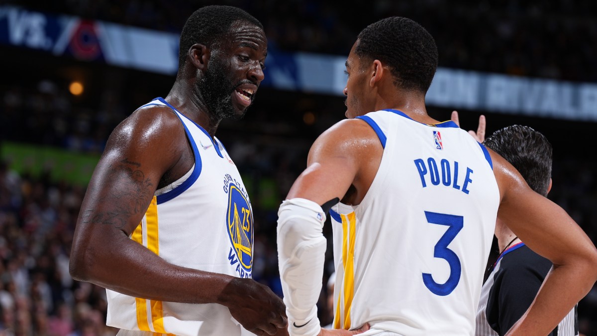 DENVER, CO - APRIL 24: Draymond Green #23 and Jordan Poole #3 of the Golden State Warriors talk during Round 1 Game 4 of the 2022 NBA Playoffs on April 24, 2022 at the Ball Arena in Denver, Colorado. NOTE TO USER: User expressly acknowledges and agrees that, by downloading and/or using this Photograph, user is consenting to the terms and conditions of the Getty Images License Agreement. Mandatory Copyright Notice: Copyright 2022 NBAE (Photo by Garrett Ellwood/NBAE via Getty Images)
