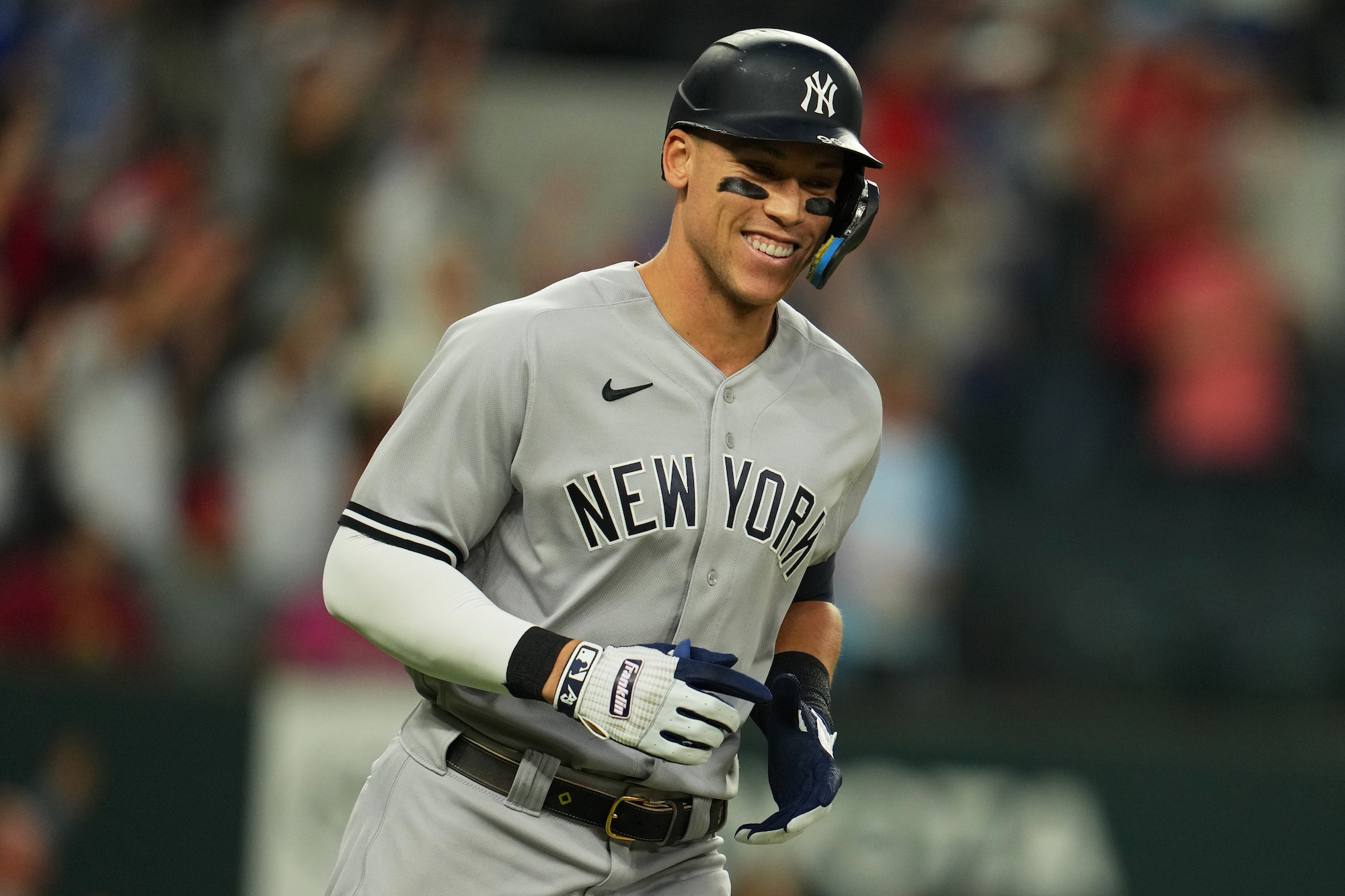 ARLINGTON, TX - OCTOBER 04: Aaron Judge #99 of the New York Yankees runs the bases after hitting his 62nd home run in the first inning breaking the American League home run record during the game between the New York Yankees and the Texas Rangers at Globe Life Field on Tuesday, October 4, 2022 in Arlington, Texas. (Photo by Cooper Neill/MLB Photos via Getty Images)