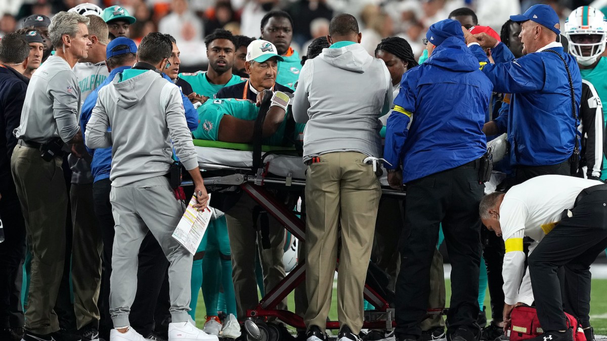 Medical staff tend to quarterback Tua Tagovailoa #1 of the Miami Dolphins as he is carted off on a stretcherafter an injury during the 2nd quarter of the game against the Cincinnati Bengals at Paycor Stadium on September 29, 2022.
