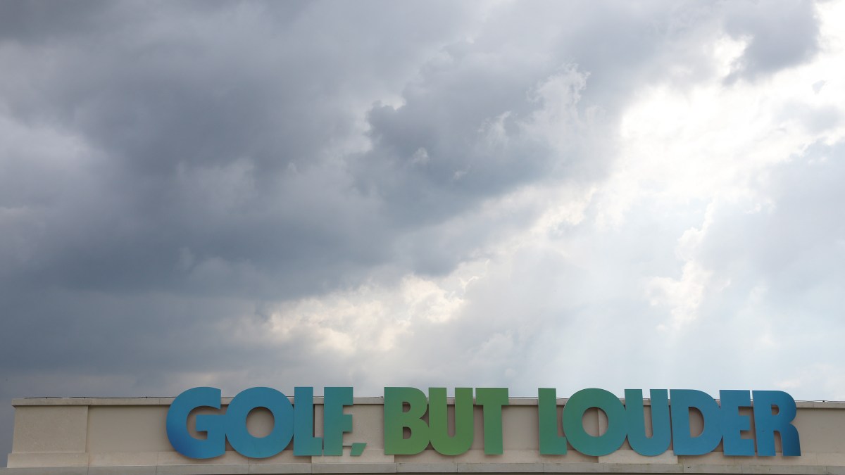 Ominous clouds over LIV Golf's slogan, "Golf, But Louder" at the tour's October event in Bangkok, Thailand.
