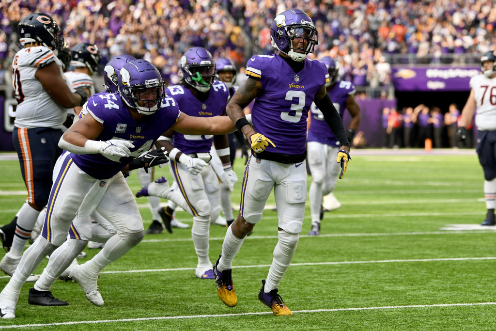 Cameron Dantzler Sr. #3 of the Minnesota Vikings celebrates after making an interception to end the game against the Chicago Bears
