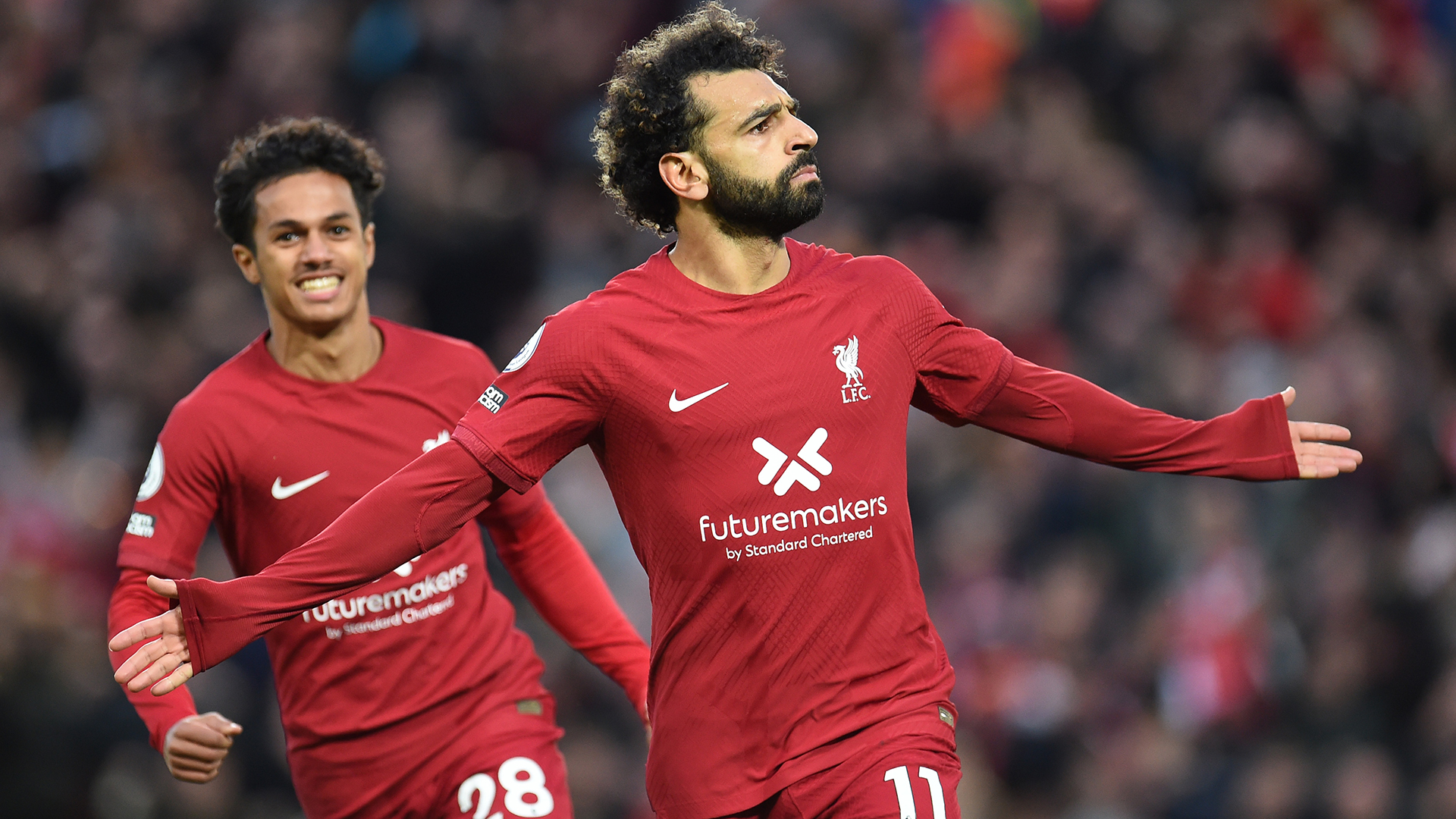 Mohamed Salah of Liverpool celebrates after scoring the first goal during the Premier League match between Liverpool FC and Manchester City at Anfield on October 16, 2022 in Liverpool, England.