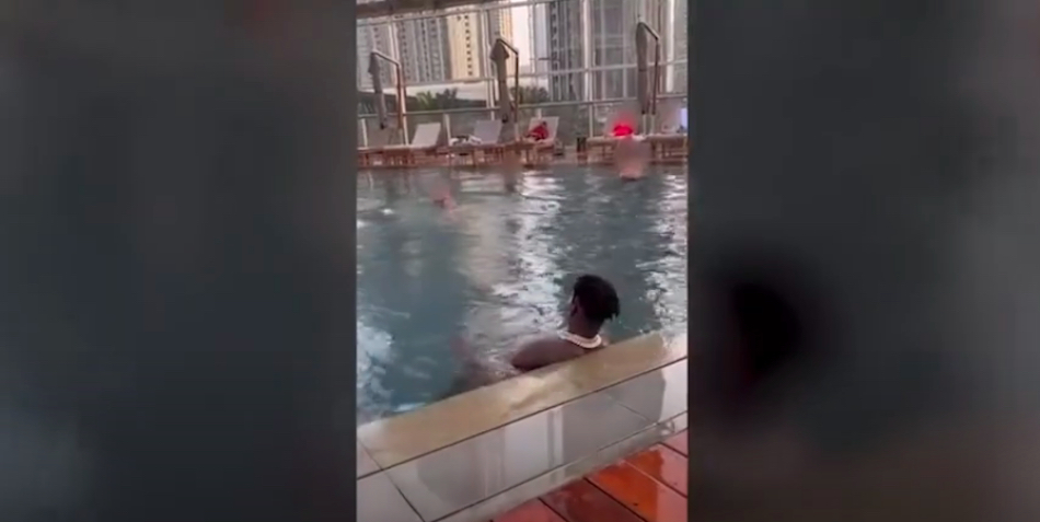 Antonio Brown exposes himself at a hotel pool in Dubai.