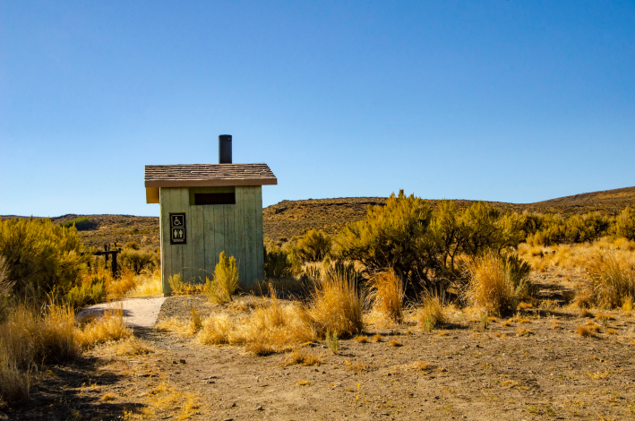 A rustic outhouse