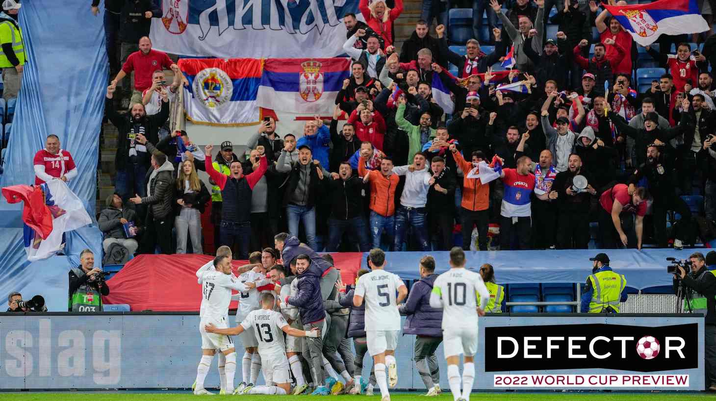 Serbia's players cheer in front of their supporters after Serbia's forward Aleksandar Mitrovic scored 0-2 during the UEFA Nations League Group 4 between Norway and Serbia in Oslo on September 27, 2022.