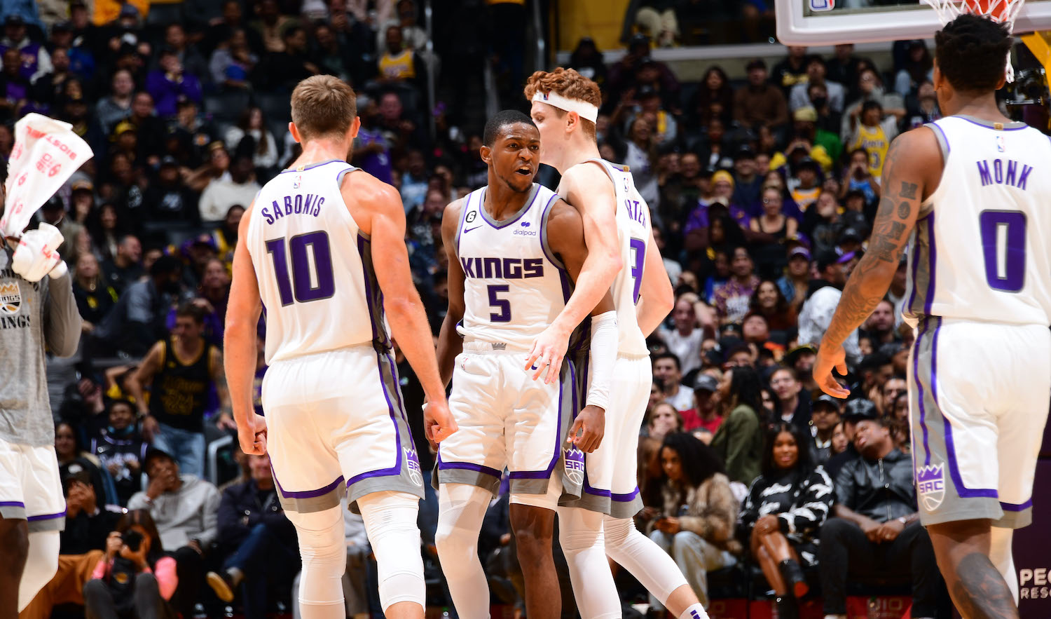 LOS ANGELES, CA - NOVEMBER 11: De'Aaron Fox #5 of the Sacramento Kings reacts to a play during the game against the Los Angeles Lakers on November 11, 2022 at Crypto.com Arena in Los Angeles, California. NOTE TO USER: User expressly acknowledges and agrees that, by downloading and/or using this Photograph, user is consenting to the terms and conditions of the Getty Images License Agreement. Mandatory Copyright Notice: Copyright 2022 NBAE (Photo by Adam Pantozzi/NBAE via Getty Images)