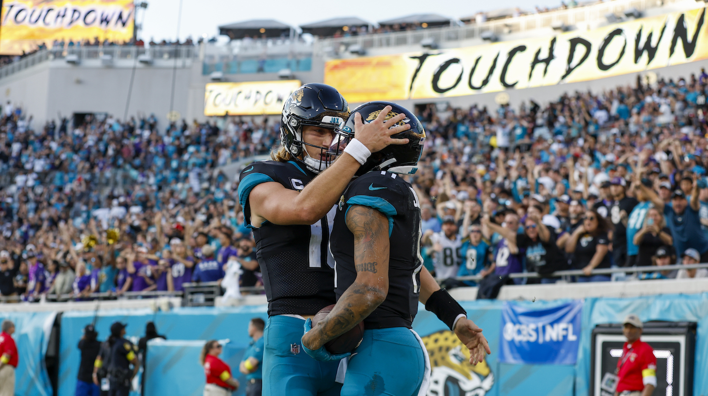 Jacksonville Jaguars quarterback Trevor Lawrence (16) and Jacksonville Jaguars wide receiver Marvin Jones Jr. (11) celebrate a touchdown during the game between the Baltimore Ravens and the Jacksonville Jaguars on November 27, 2022 at TIAA Bank Field in Jacksonville, Fl.