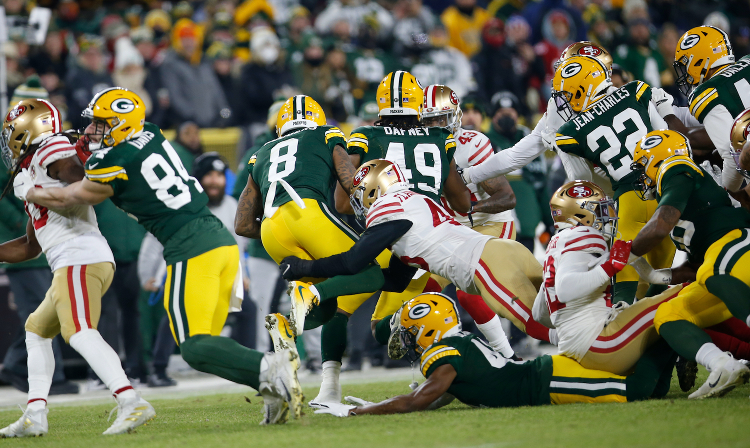 GREEN BAY, WISCONSIN - JANUARY 22: Demetrius Flannigan-Fowles #45 of the San Francisco 49ers tackles Amari Rodgers #8 of the Green Bay Packers during the NFC Divisional Playoff game at Lambeau Field on January 22, 2022 in Green Bay, Wisconsin. The 49ers defeated the Packers 13-10. (Photo by Michael Zagaris/San Francisco 49ers/Getty Images) *** Local Caption *** Demetrius Flannigan-Fowles;Amari Rodgers
