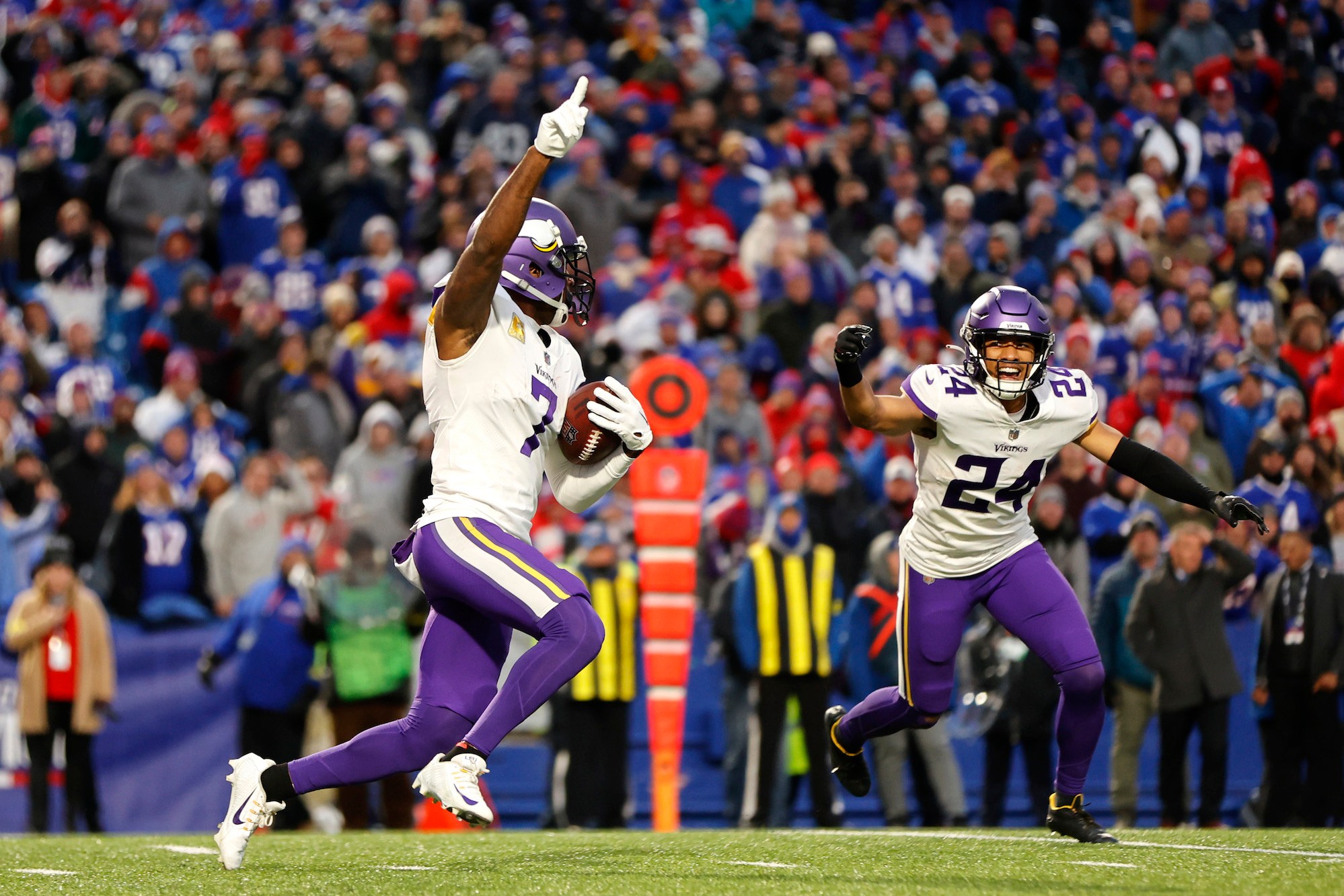 ORCHARD PARK, NEW YORK - NOVEMBER 13: Patrick Peterson #7 of the Minnesota Vikings and Camryn Bynum #24 of the Minnesota Vikings celebrate after Peterson's game winning interception in overtime against the Buffalo Bills at Highmark Stadium on November 13, 2022 in Orchard Park, New York. (Photo by Isaiah Vazquez/Getty Images)