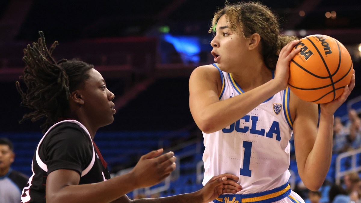 LOS ANGELES, CALIFORNIA - NOVEMBER 13: Kiki Rice #1 of the UCLA Bruins looks to pass during the first half of a game against the Troy Trojans at UCLA Pauley Pavilion on November 13, 2022 in Los Angeles, California.