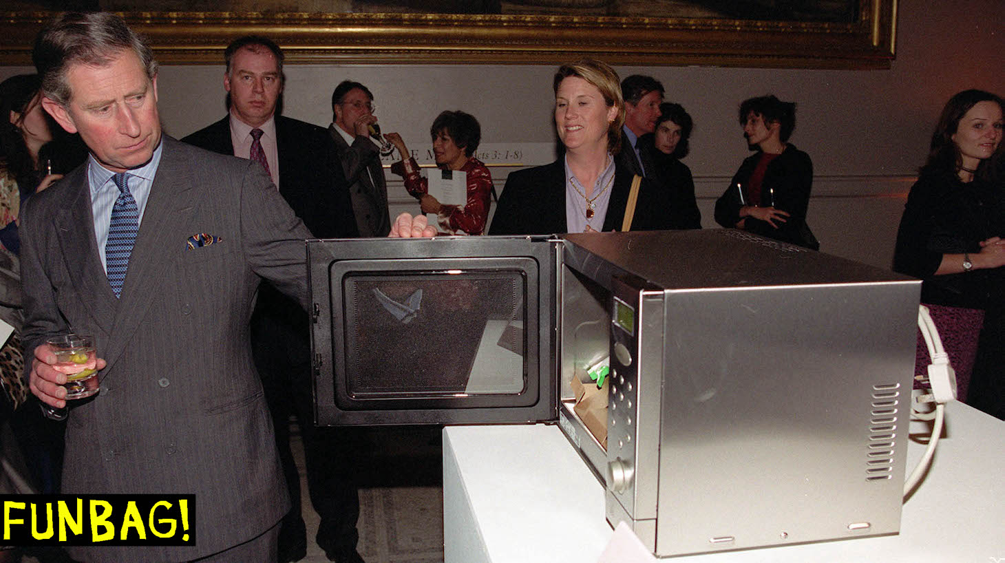 The Prince of Wales looks closely at the Sanyo UK Microwave Oven from the Steel Life' range, during an award ceremony held at The Victoria and Albert Museum in central. * The Homes and Gardens Classical Design Awards, recognise and reward outstanding contempary British Design in everyday items, the magazine Readers Award went to the Sanyo oven which was chosen for unusually simple, pleasant and modern styling. (Photo by Peter Jordan - PA Images/PA Images via Getty Images)