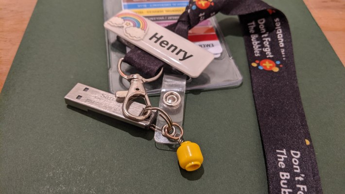 A photo of a medical professional's lanyard that reads "Don't Forget the Bubbles" and has a small yellow Lego head attached.