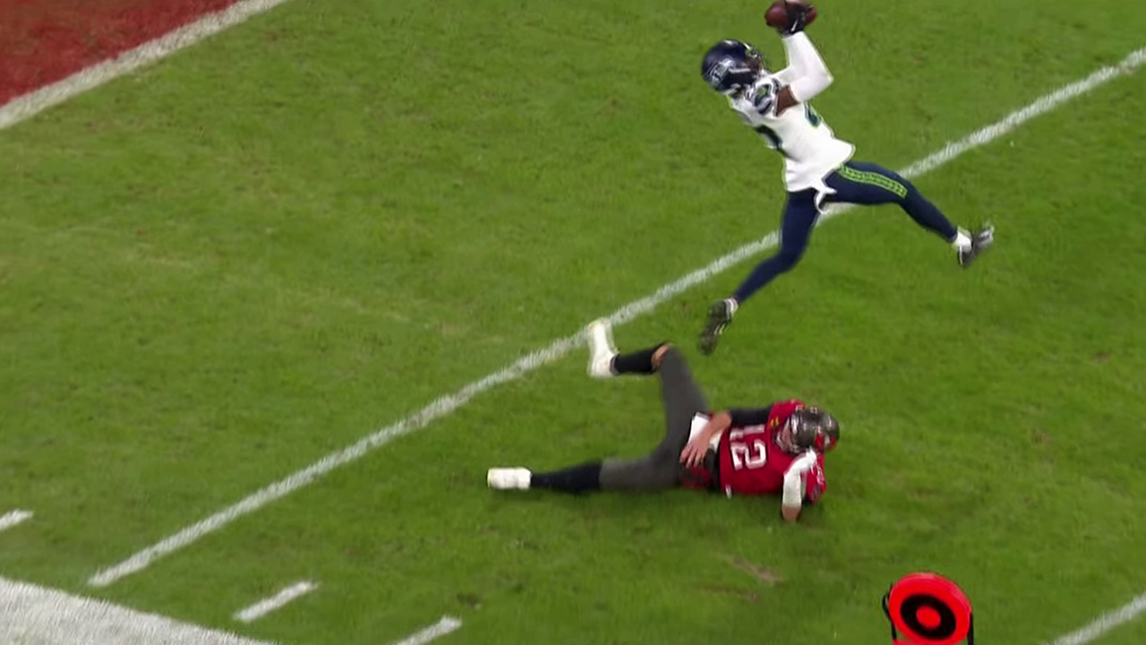 Seahawks interception as Tom Brady lays on the ground