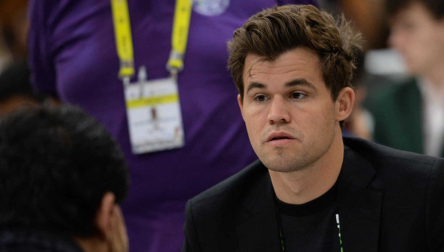 Norways Magnus Carlsen (R) gestures during his round 9 game against the Indonesias team at the 44th Chess Olympiad 2022, in Mahabalipuram on August 7, 2022. (Photo by Arun SANKAR / AFP) (Photo by ARUN SANKAR/AFP via Getty Images)