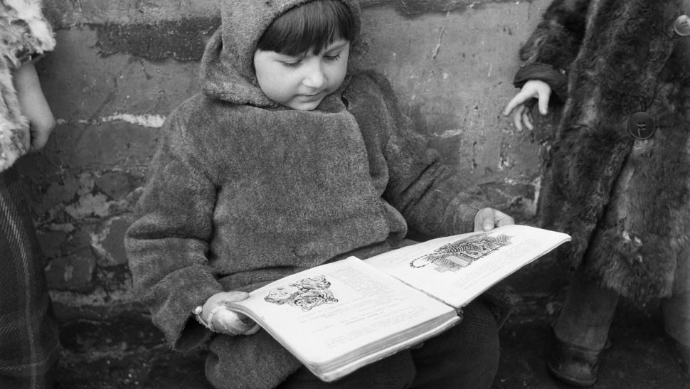 A child reads in the USSR.